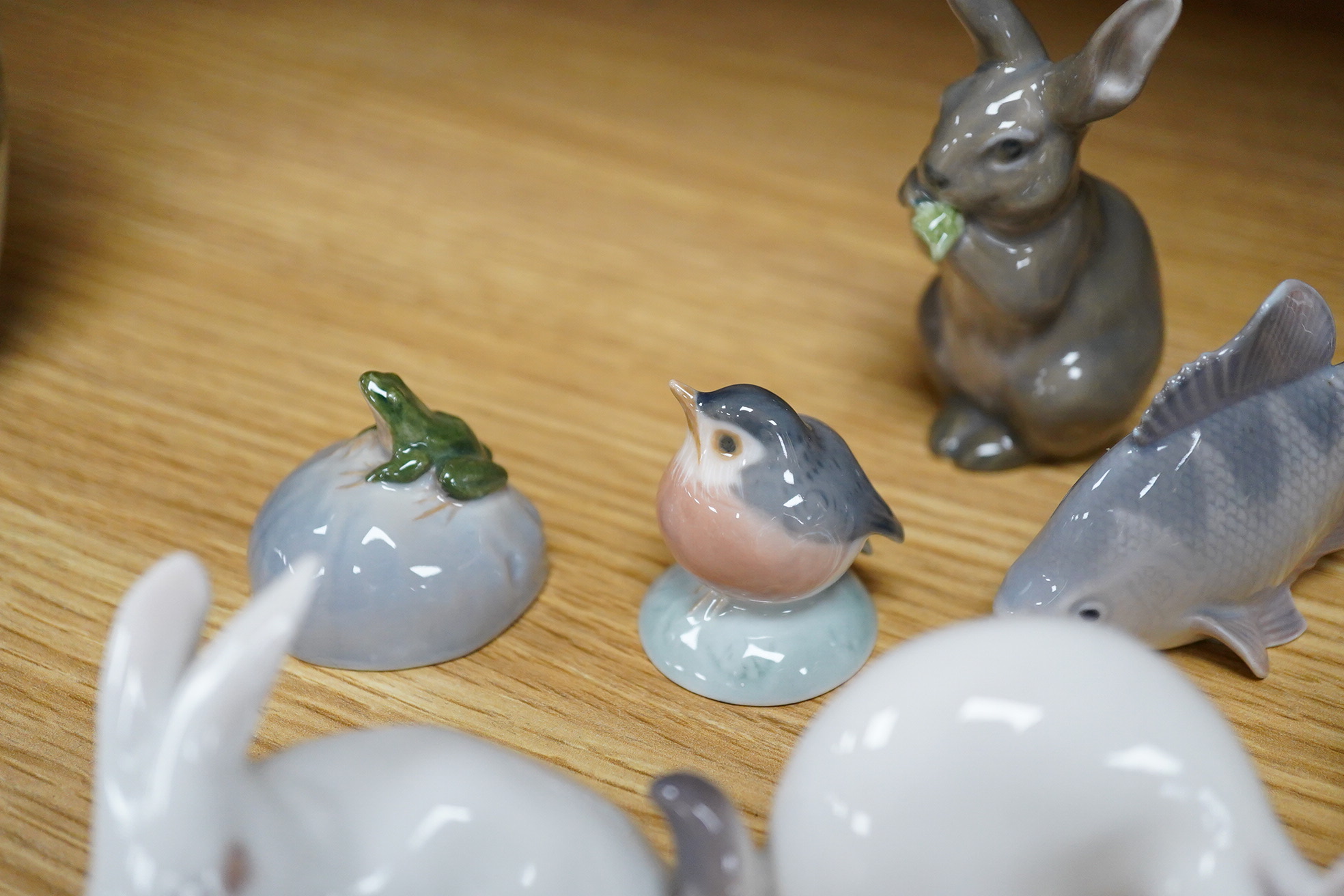 Six small Copenhagen figures, a Derby penguin and four other items